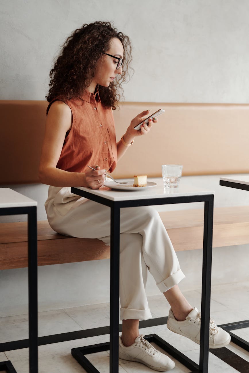 a woman looking at her phone