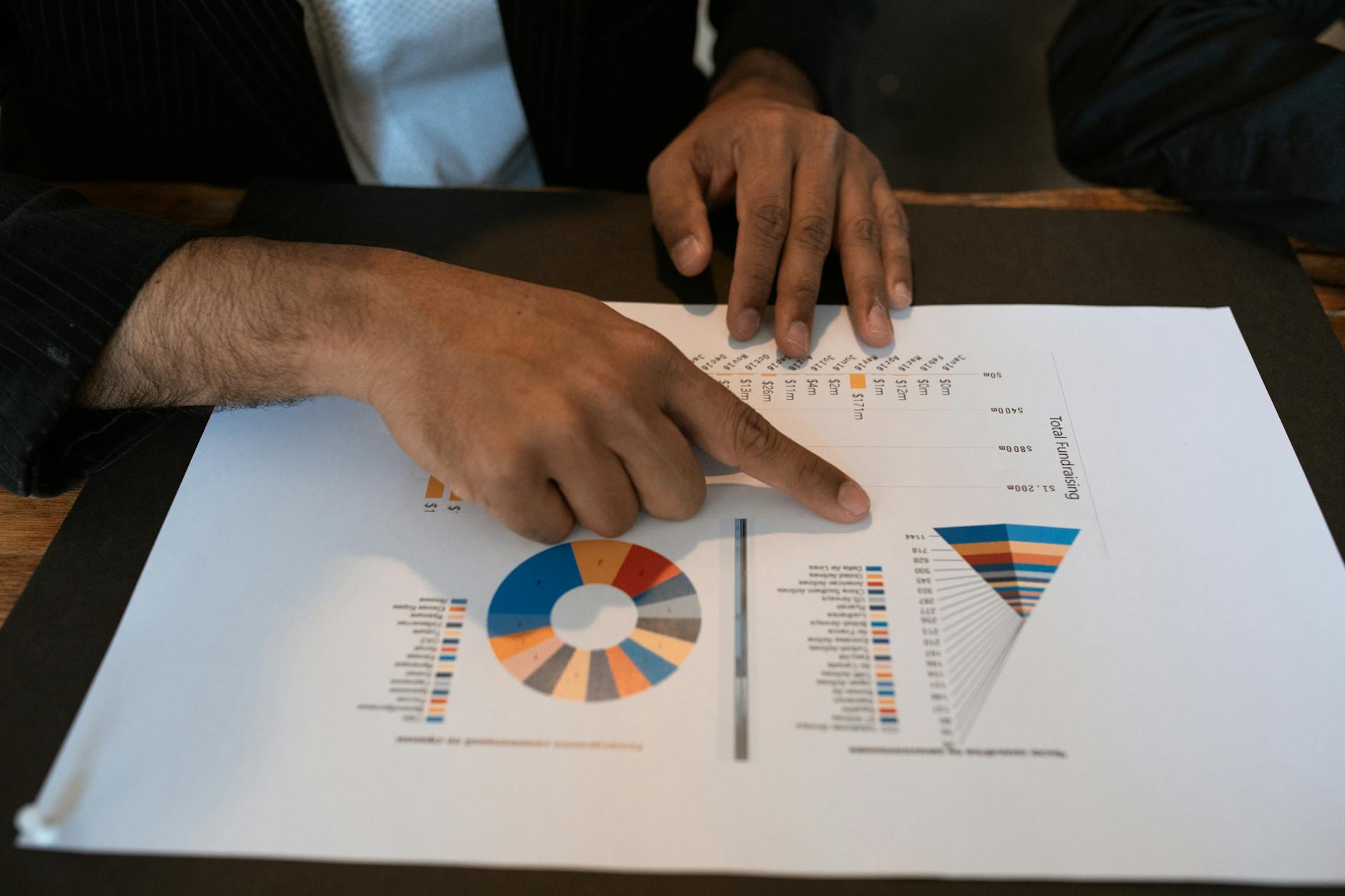 person holding white printer paper