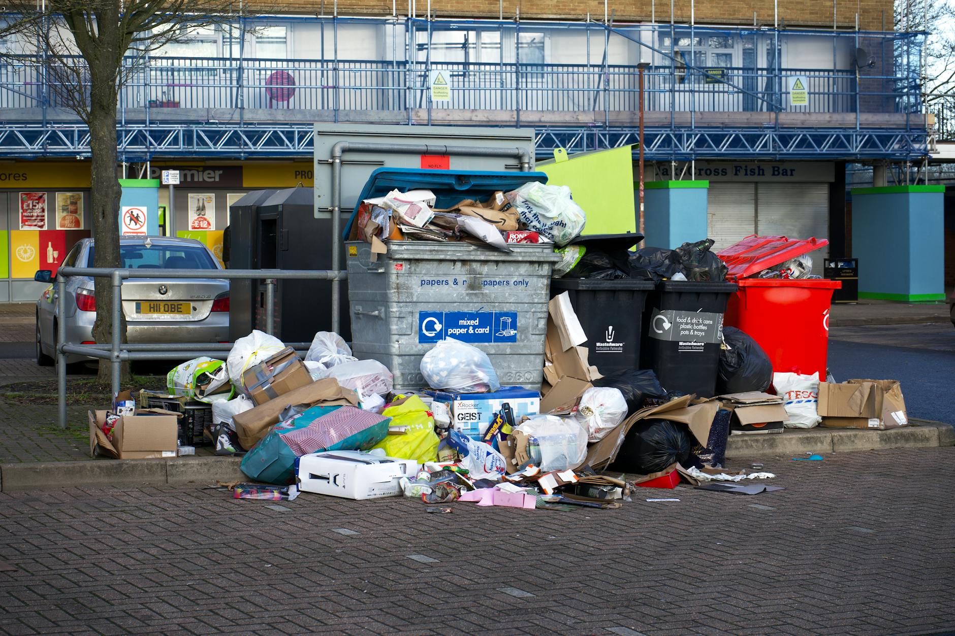 a pile of trash in an urban area
