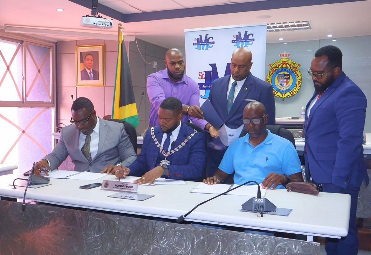 Contract signing at the St James Municipal Corporation for Harbour Circle roadway and St James Street sidewalk works in Montego Bay