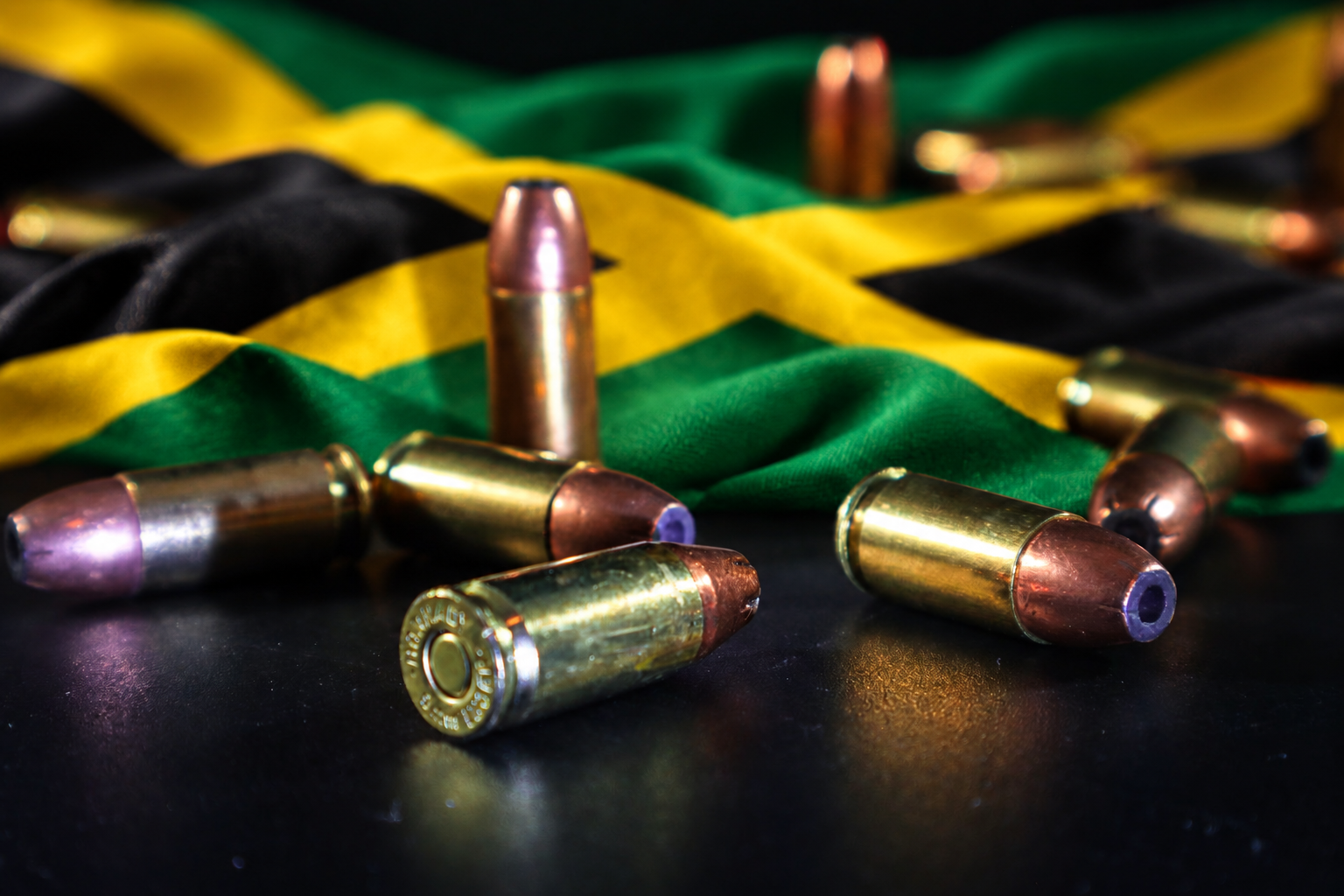 A symbolic image of ammunition set against the Jamaican flag, reflecting the national debate over firearms, public safety, crime prevention and the penalties attached to illegal gun possession.