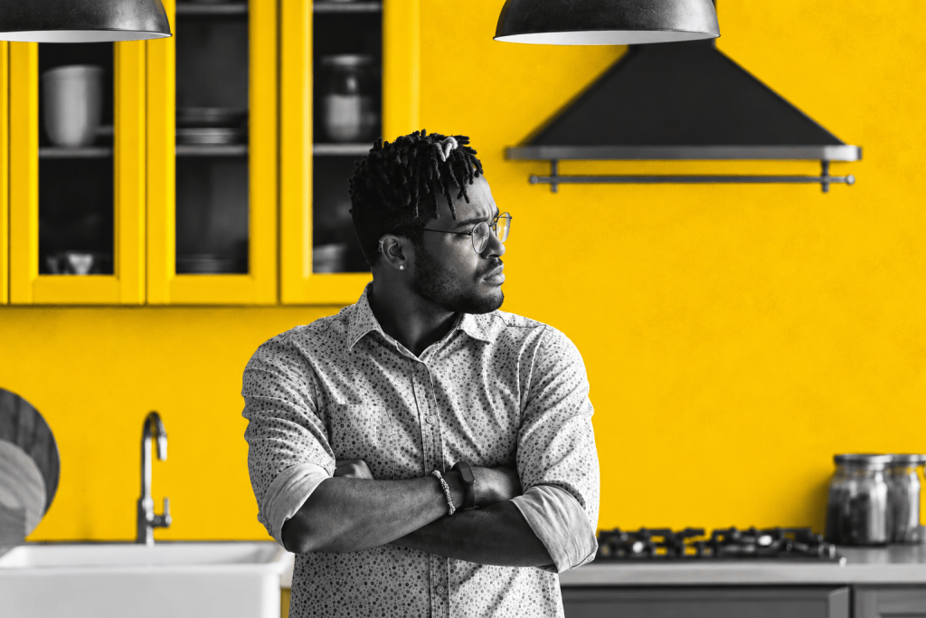 A Jamaican homeowner looks on with concern as the pressures of property ownership, rising costs and an uncertain housing market begin to hit home.