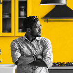 A Jamaican homeowner looks on with concern as the pressures of property ownership, rising costs and an uncertain housing market begin to hit home.