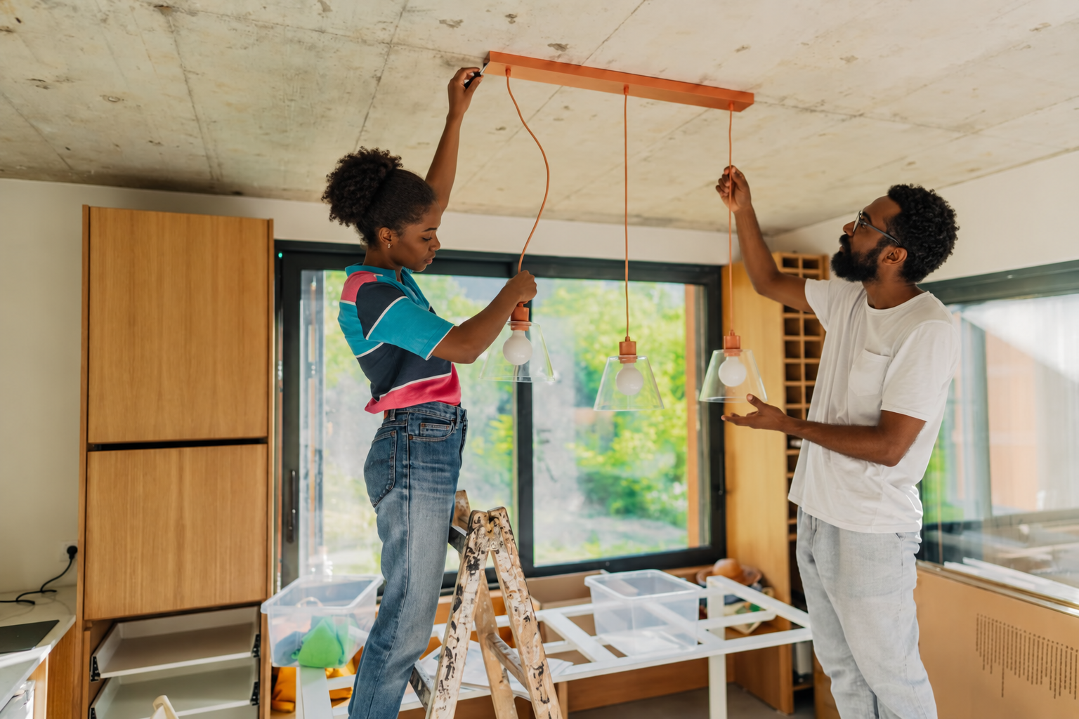 A Jamaican couple tackles a home lighting upgrade, a reminder that DIY renovation can save money when the planning, measurements and safety checks are done properly.