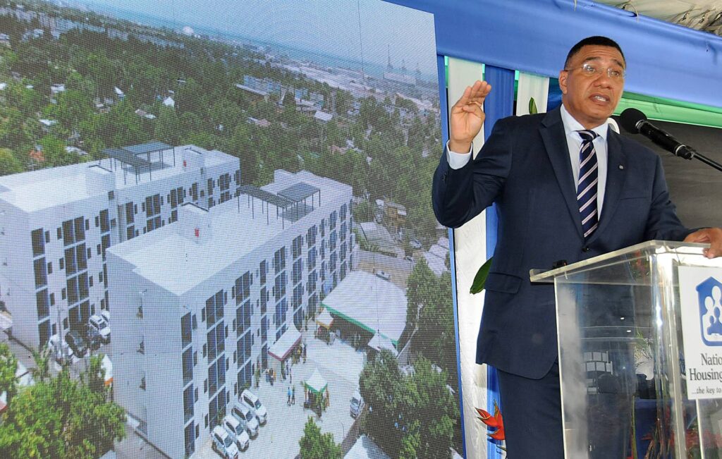 Prime Minister Andrew Holness delivers the keynote address at the handover ceremony for The Howard Apartments in St Andrew