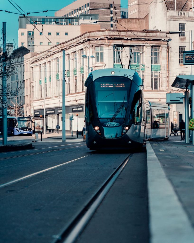 tram on street in nottingham in england - Photo by Lee Dunican