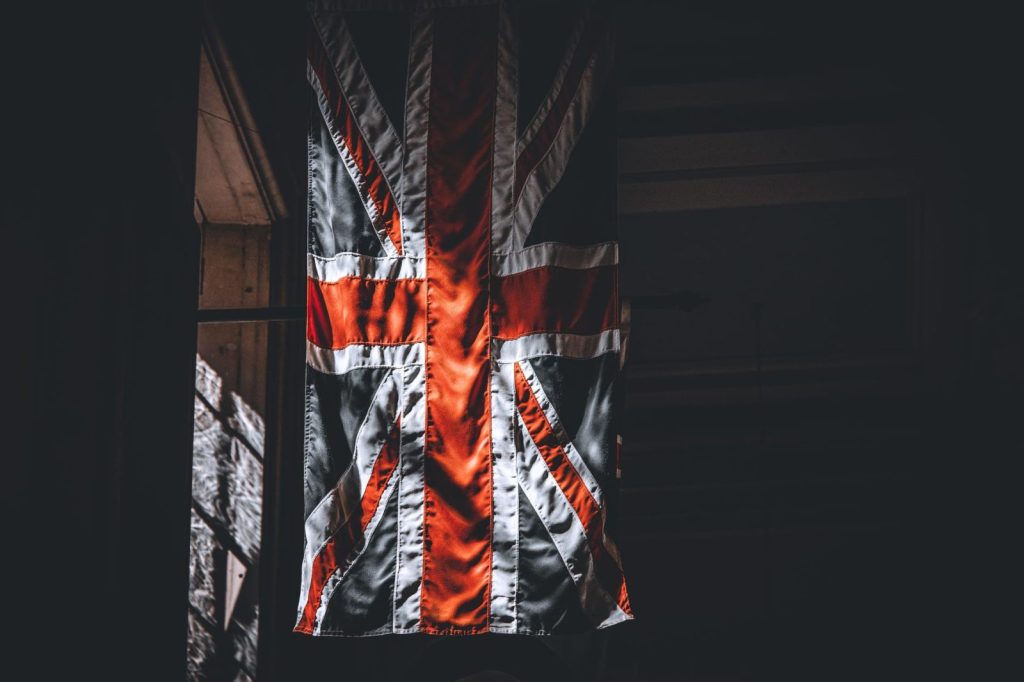dramatic british flag in indoor setting - Photo by Efrem Efre
