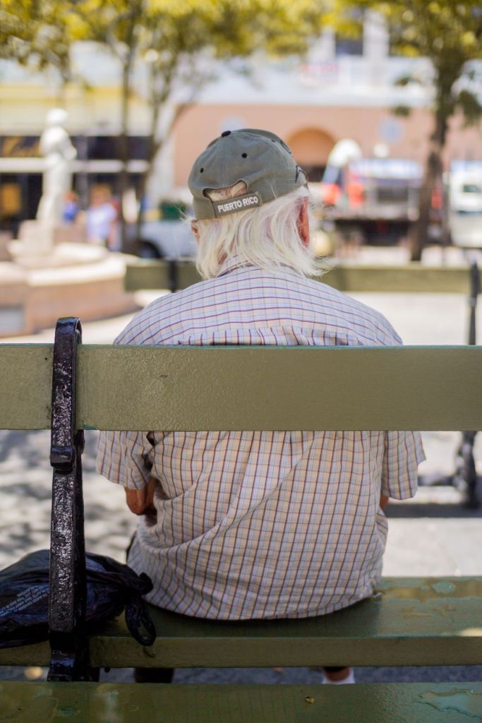 Puerto Rico’s Drought Puts Development Under Pressure older man relaxing on park bench in puerto rico - Photo by Caleb Oquendo