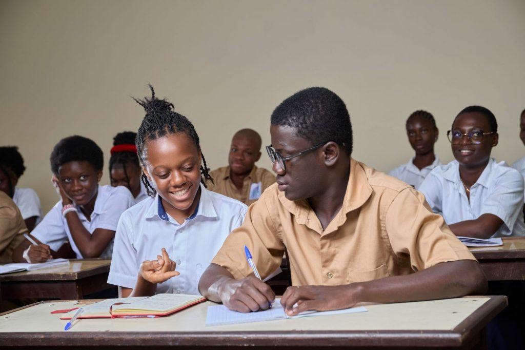 The School List Is Also a Property Map engaged students in a classroom setting - Photo by mickael ange konan