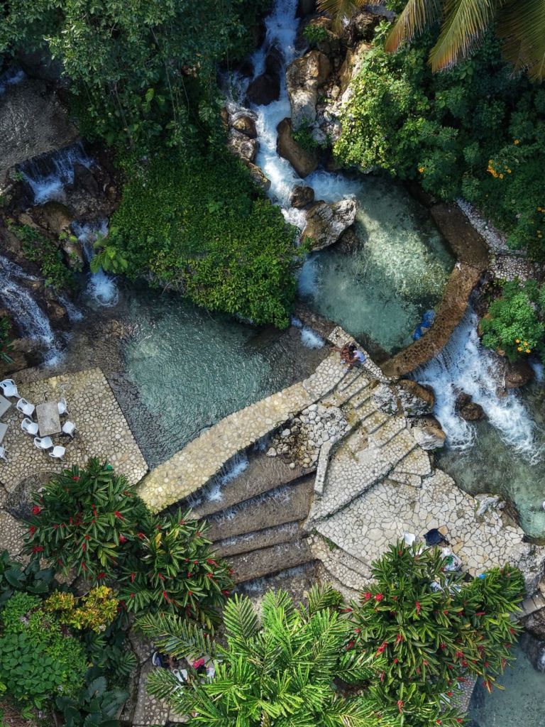 Dunn’s River Expansion aerial view of lush tropical terrain and waterfalls - Photo by Arlin Raf