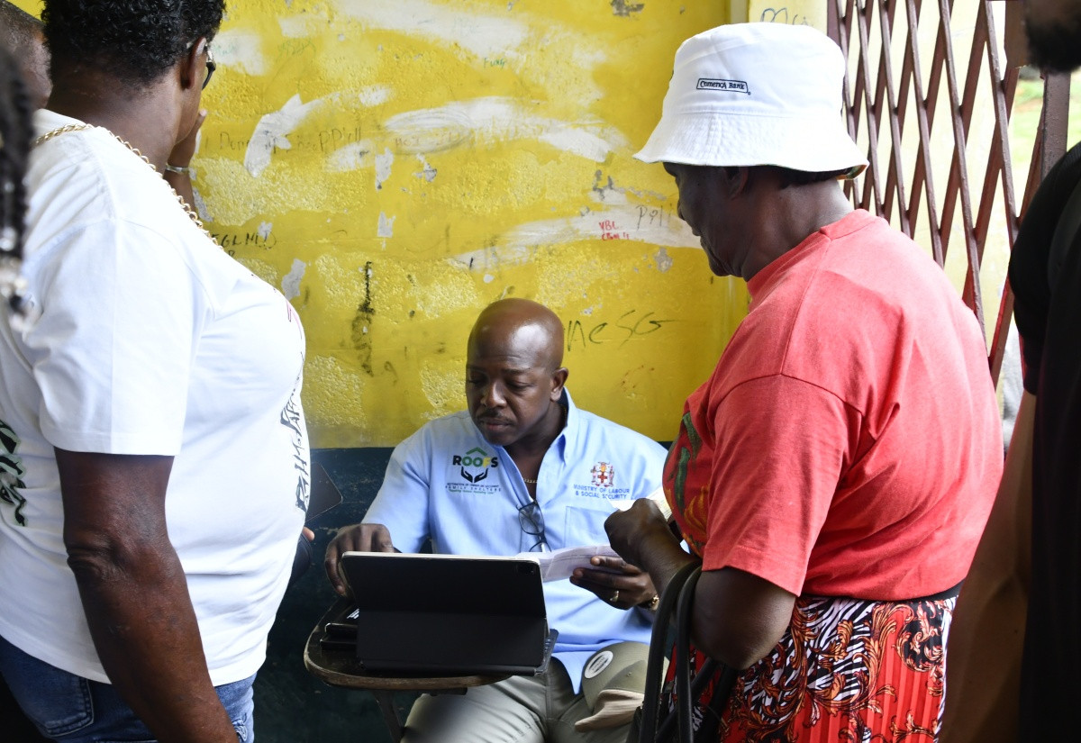 Minister of Labour and Social Security assists St Elizabeth residents at a ROOFS programme field exercise